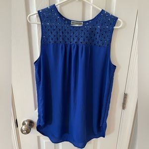 Pleione medium blue, size M sleeveless top. Polyester with cotton contrast.